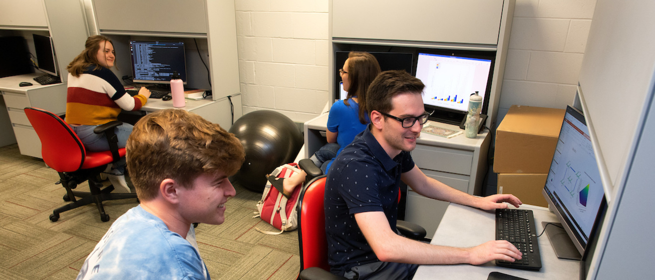 Students work in Michael Schnieders's lab